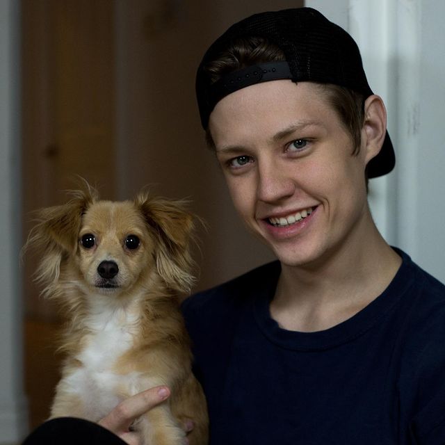 Aaron Doh with his pet Dog