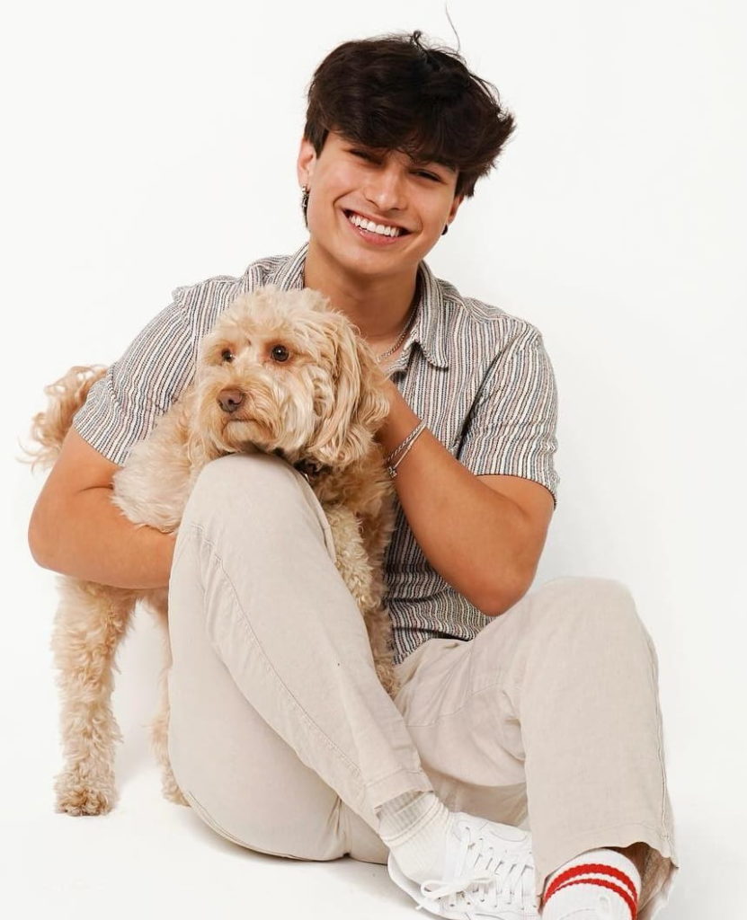 Kio Cyr with Pet Dog