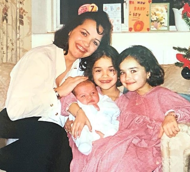 Rita Ora With her Mother, Sister, and brother in childhood