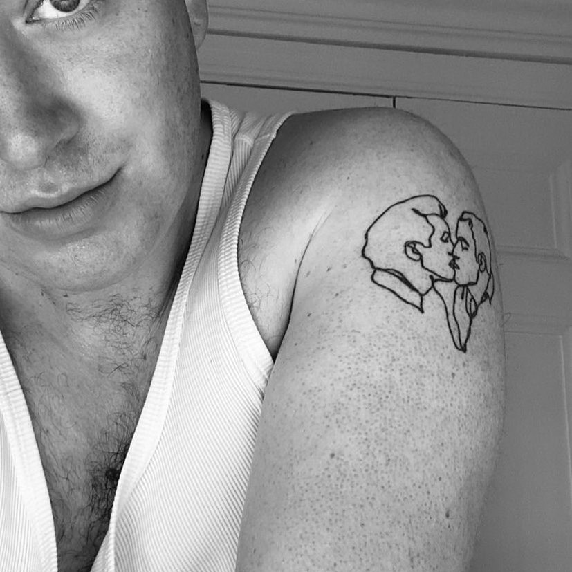 Sam Smith tattoo on his Left Arm